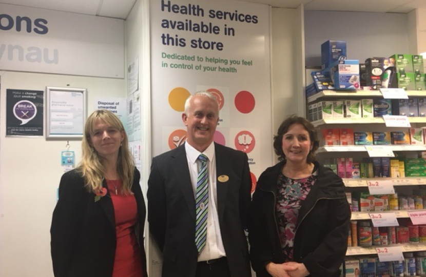 Judy Henley from Community Pharmacy Wales; Peter Lanham, Manager of Boots Pharmacy in Penrhyn Bay; Janet Finch-Saunders AM