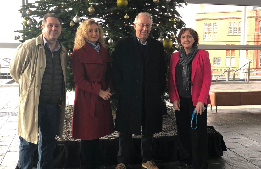 Janet with Mr Stuart Davies, Mrs Davies, and Mr Geoff Ryall-Harvey, Chief Officer, Community Health Council