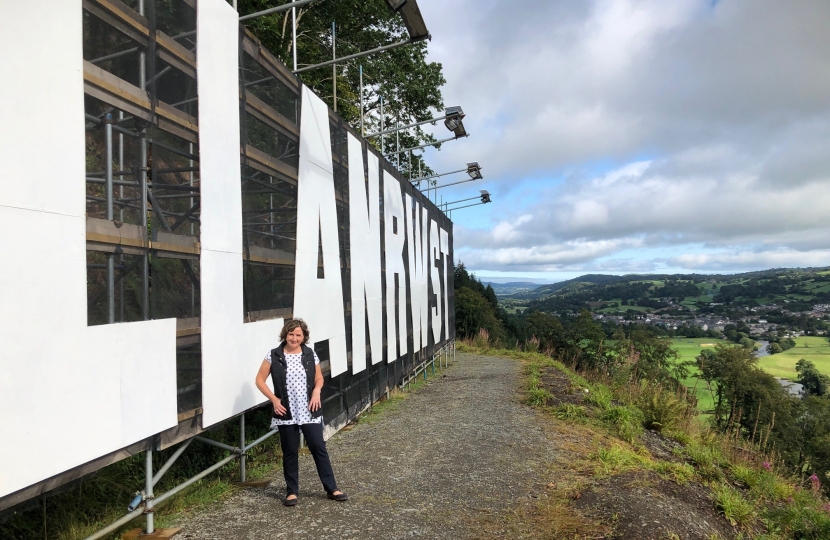 Janet by the Llanrwst sign