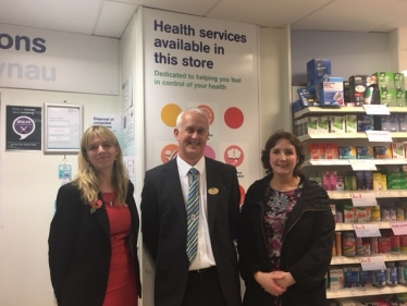 Judy Henley from Community Pharmacy Wales; Peter Lanham, Manager of Boots Pharmacy in Penrhyn Bay; Janet Finch-Saunders AM
