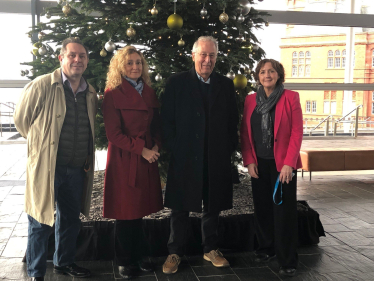 Janet with Mr Stuart Davies, Mrs Davies, and Mr Geoff Ryall-Harvey, Chief Officer, Community Health Council